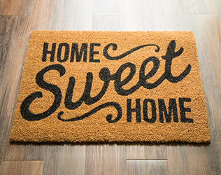 welcome mat that says Home Sweet Home