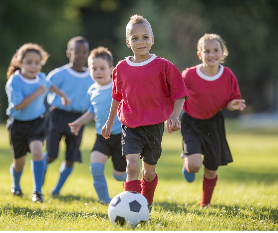 https://harvestatlimoneira.com/wp/../shared/2024/06/kids-playing-soccer-green-spaces.jpg